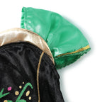 Winter Fairytale Princess Dress close-up of the green short sleeve with gold-colored edging and gathered trim