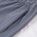 Women’s Reflective Joggers close-up showing a side pocket opening beneath the elastic waistband