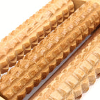 Wooden Foot Massage Board close-up showing raised roller contours and variations in the wood grain