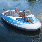 Yacht Inflatable Lounge Boat on calm water with friends around the seating area and a person on the front lounge