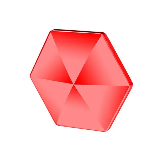 HexFlip fidget toy in bright red with hexagonal shape and geometric surface pattern - sleek stress relief design