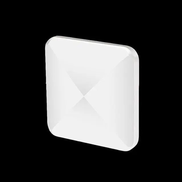 HexFlip fidget toy in white, square-shaped with geometric center indent on black background - stress relief gadget