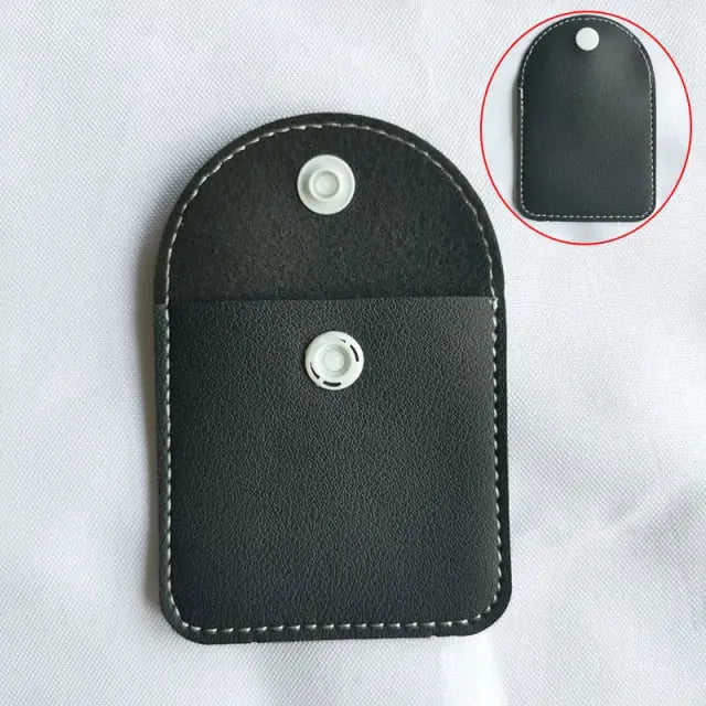 Black leather protective case for HexFlip fidget toy with snap closure and curved edges on white background