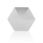 HexFlip metal fidget toy in silver hexagonal shape on white background with reflective surface