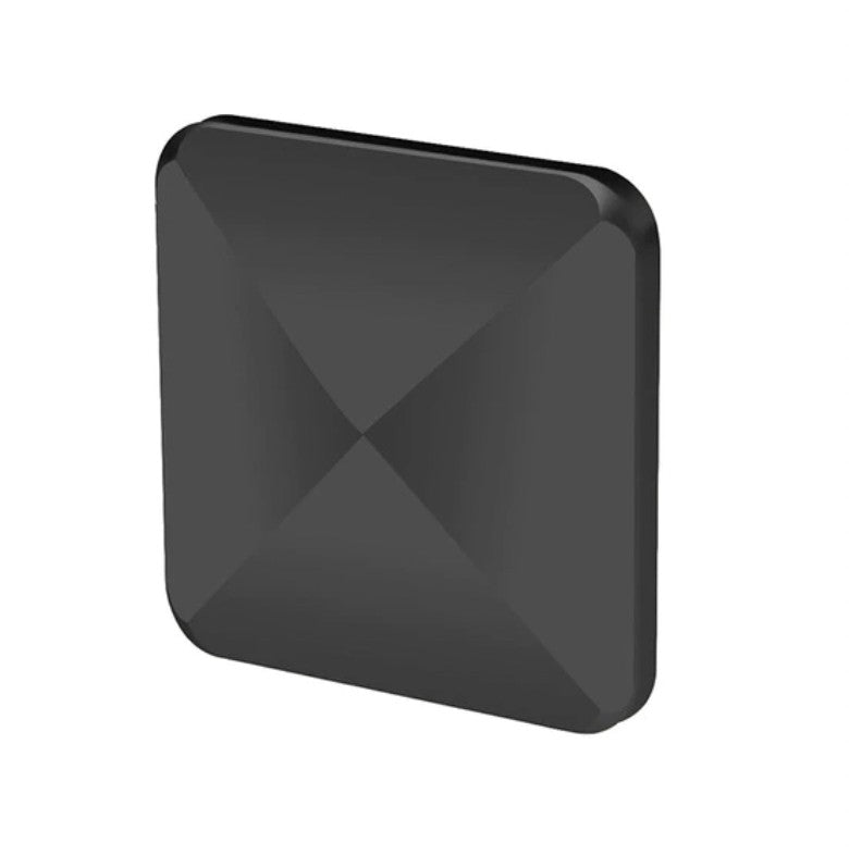 HexFlip fidget toy in sleek black metal with geometric pyramid design on smooth surface - stress relief gadget