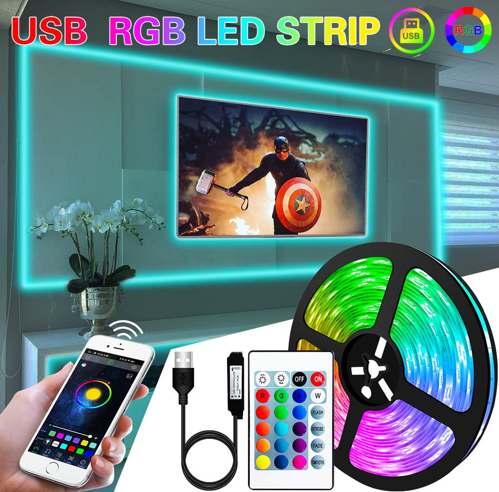 HighPeak LED Lights - 100 Feet USB RGB LED strip glowing multi-color behind TV with remote and app control.