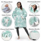Oversized Hoodie Blanket in mint tie-dye pattern with sherpa lining, elastic sleeves and front pocket, shown with product features