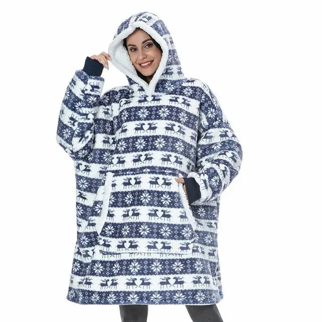 Oversized Hoodie Blanket in navy and white Nordic pattern with reindeer print, featuring cozy sherpa lining and kangaroo pocket