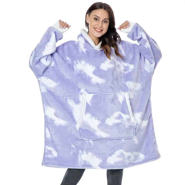 Person wearing Oversized Hoodie Blanket in lavender tie-dye pattern with kangaroo pocket and white trim - cozy loungewear