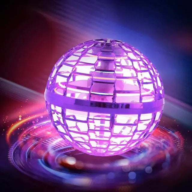 RoboFly flying fidget toy glowing in purple with illuminated orb cage design against dark background with light effects